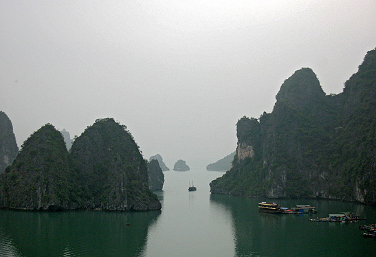 limestone karst islets at Halong Bay, Vietnam on a foggy day