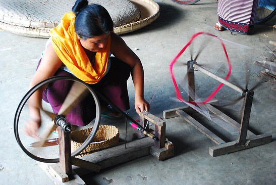 a weaver at work at one of the store-front sustainability projects in Jomsom, Nepal