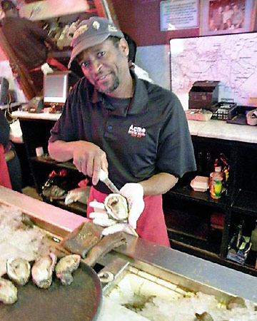 Master Oyster Shucker Michael Broadway aka. Hollywood at work at Acme's Oyster Bar