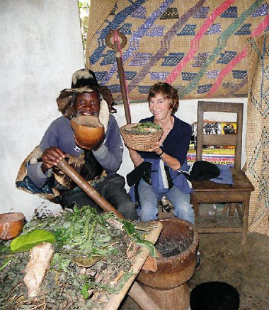 writer with traditional medicine man at a Pygmy tribal village