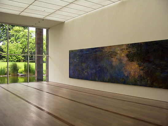 Monet's Reflections of Clouds on the Water-Lily Pond at the Fondation Beyeler with pond and garden in the left background