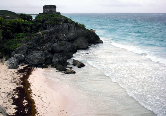 the beach at Tulum with Mayan ruins in the background