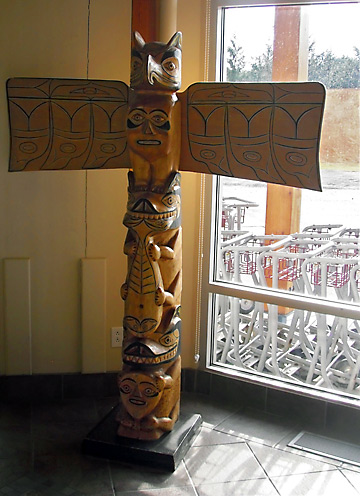 a totem pole at a corner of the Prince Rupert/Digby Island Airport
