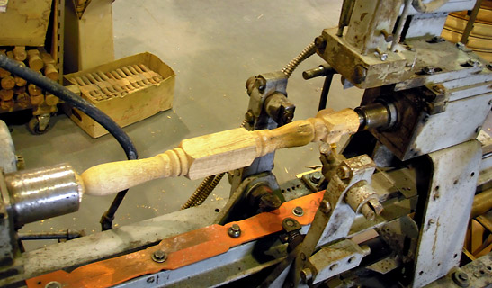 close-up of a steering wheel spoke being fashioned by Lubzinski's spoke lathe