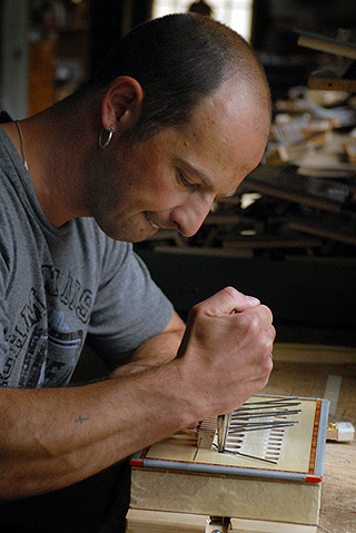 Christian working on an accordion