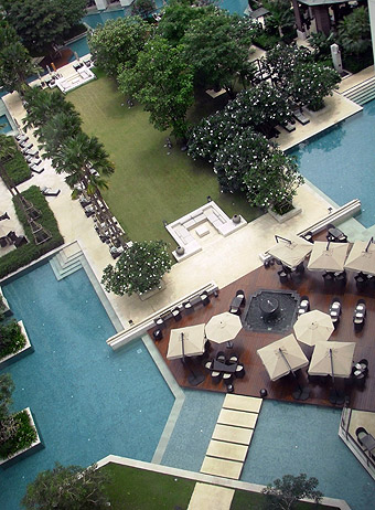 view of the pools and gardens from the tenth floor, Siam Kempinski Hotel