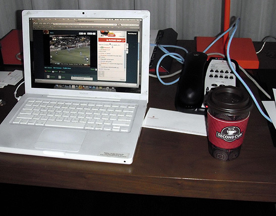 laptop and cup of coffee: complimentary WiFi services at the Hotel Le Germain Maple Leaf Square