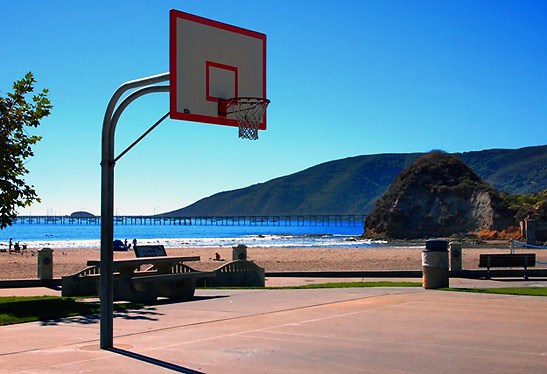 basketball court by the beach at the Avila Lighthouse Suites