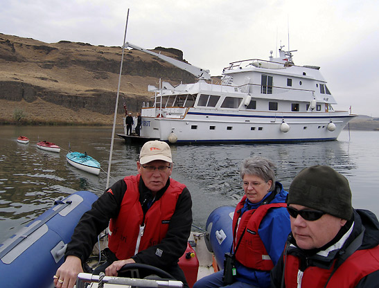 passengers from The Safari Spirit on a skiff to tour secluded coves