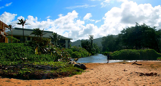 view of a lagoon and gardens at the Kauai Beach Resort