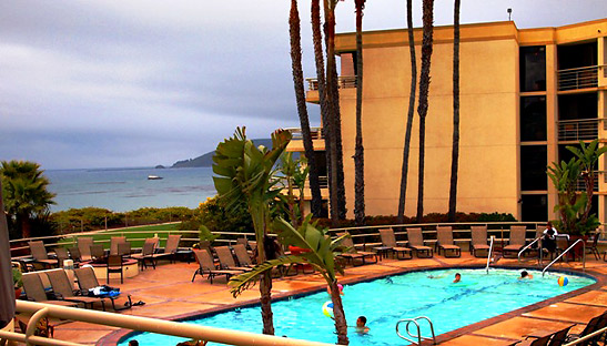 the pool at Cliffs Resort with the Pacific Ocean in the background