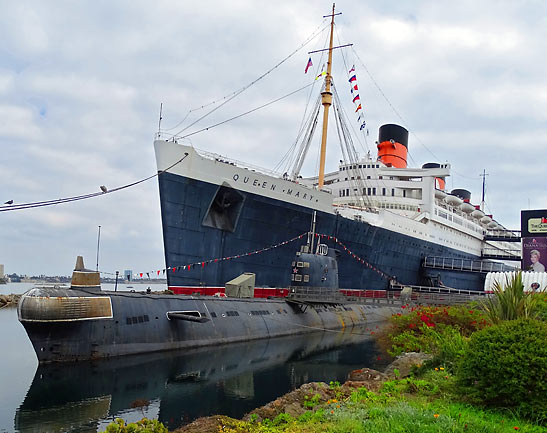 Russian Scorpion submarine of Cold War vintage docked alongside the Queen Mary