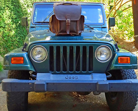 squared backpack on a jeep