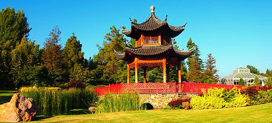 the Pagoda Lawn featuring an authentic pagoda, a garden and pond, and boulders from Thailand's River Kwai