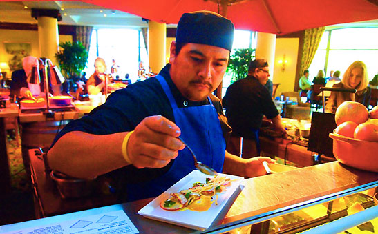 chef at work at the Marcato Italiano in 4 Seasons Hotel's Lobby Lounge on a Saturday night