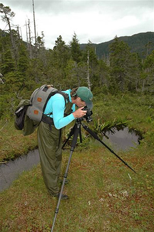 photographer checking equipment, Alaska