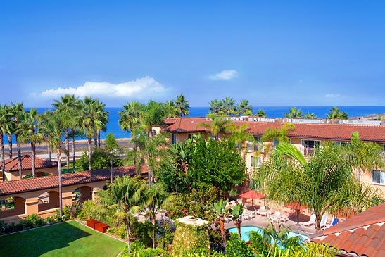 view of the hotel grounds and ocean from author's hotel room window