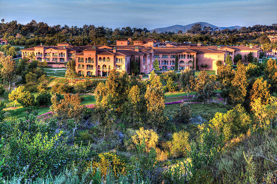 exterior view of the Grand Del Mar nestled in the rolling hills of Los Peasquitos Canyon Preserve, San Diego County