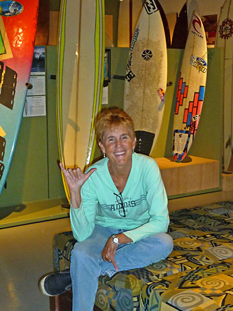 writer shopping for a surfboard