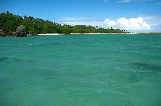 turquoise waters with Cotivas Island in the background
