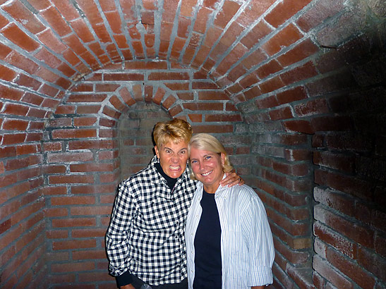 writer with friend at the catacombs of Mission Inn Hotel