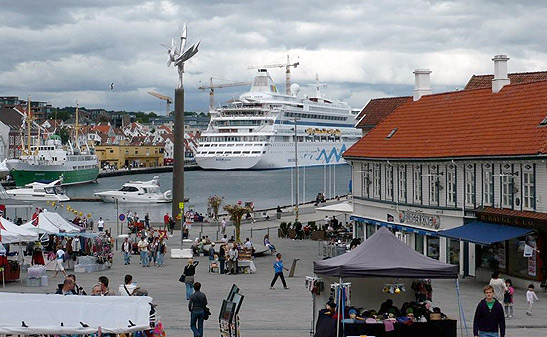 the port in Stavanger, Norway with cruise ship in the background