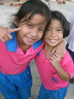a pair of Thai first graders