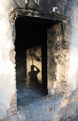 doorway of a burnt-out room