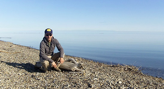 the writer on the shores of the Arctic Sea in Prudhoe Bay