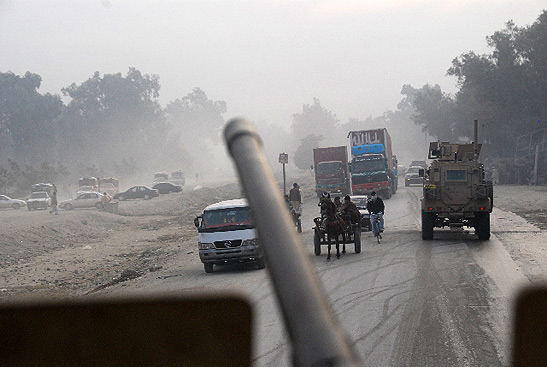 view of a road in Jalalabad from atop an MRAP