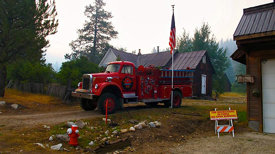 fire hydrant and old fire truck in front of the fire station in Atlanta, Idaho
