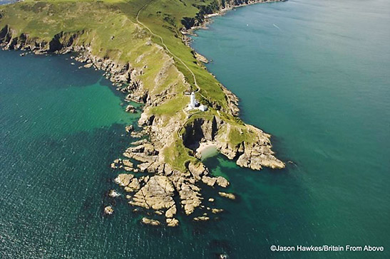 lighthouse looks out over a rugged stretch of coast near East Prawle in Devon