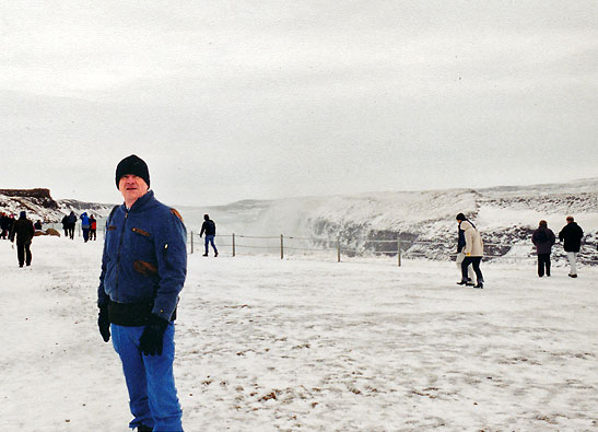 writer posing at the Gullfos Falls, Iceland