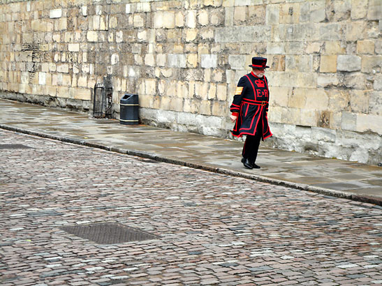 the Chief Yeoman Warder walks towards the Foot Guards and his escort at the tower of London