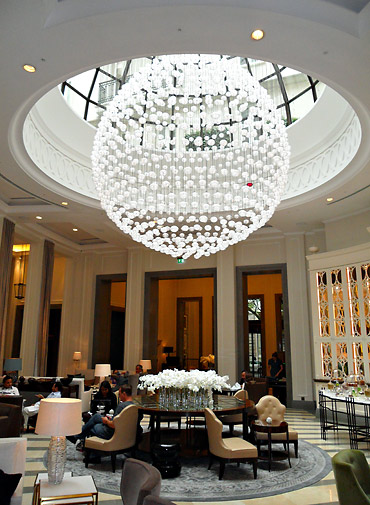 main area just above the lobby of The Corinthia Hotel showing huge chandelier