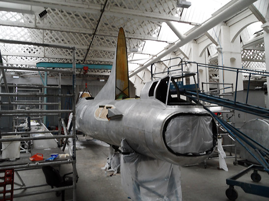 B17 Flying Fortress undergoing restoration work at a hangar, the Imperial War Museum, Duxford