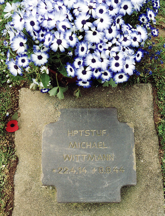 the grave of SS tank ace Michael Wittman adorned with fresh flowers