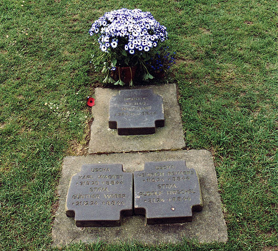 Wittman's grave along with two of his crewmen