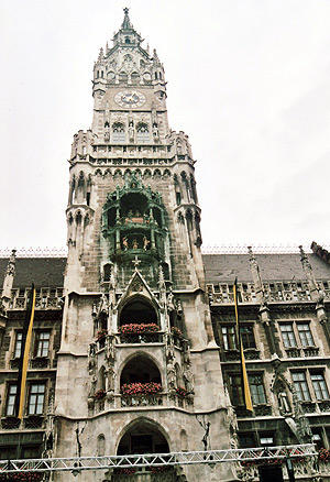 the spire of the Town Hall building at The Marienplatz showing figures of the Rathaus-Glockenspiel show