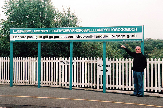 author beside train station name