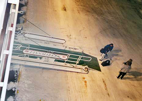 passenger disembarking Hurtigruten cruise ship