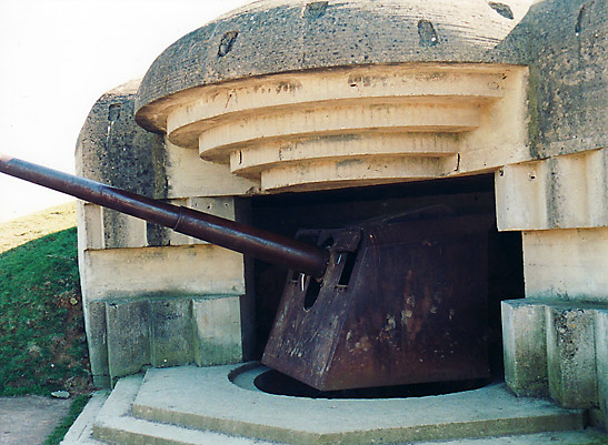 WW2-era gun on a revolving turret, Longues Battery, Arromanches Beach, Normandy, France