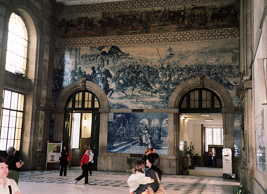 artwork in blue-colored tiles, train station at the Oporto of Sao Bento