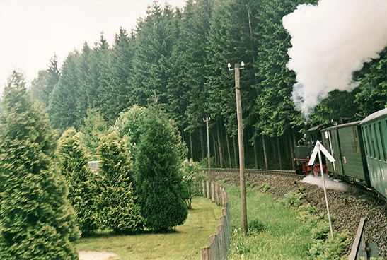 view of lush countryside from Fichtelberg Mountain Railroad steam train