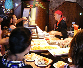 serving meals aboard the Carnival