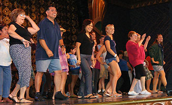 audience joins in dancing onstage