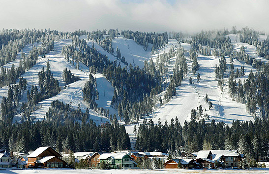 Big Bear Lake Village with ski slopes in the background