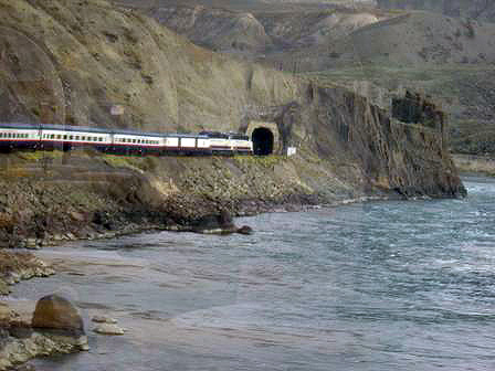 train entering a tunnel in the Canadian Rockies