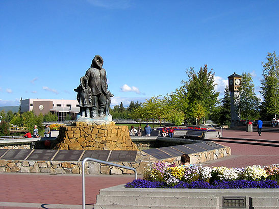 the Golden Heart Plaza with the Unknown First Family statue and the Rotary Clock Tower