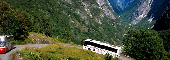 buses traveling up a steep hairpin bend at Stalheimskleiva